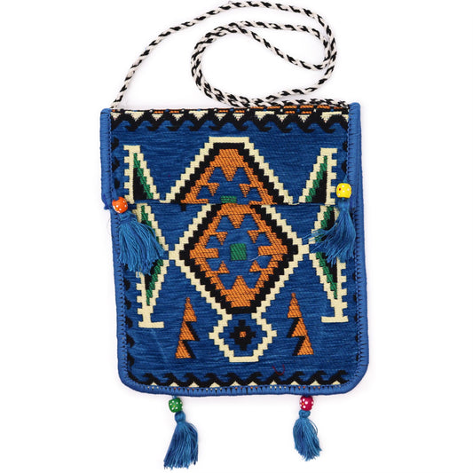 Sky blue messenger bag featuring traditional Turkish Kilim woven patterns and a long shoulder strap.