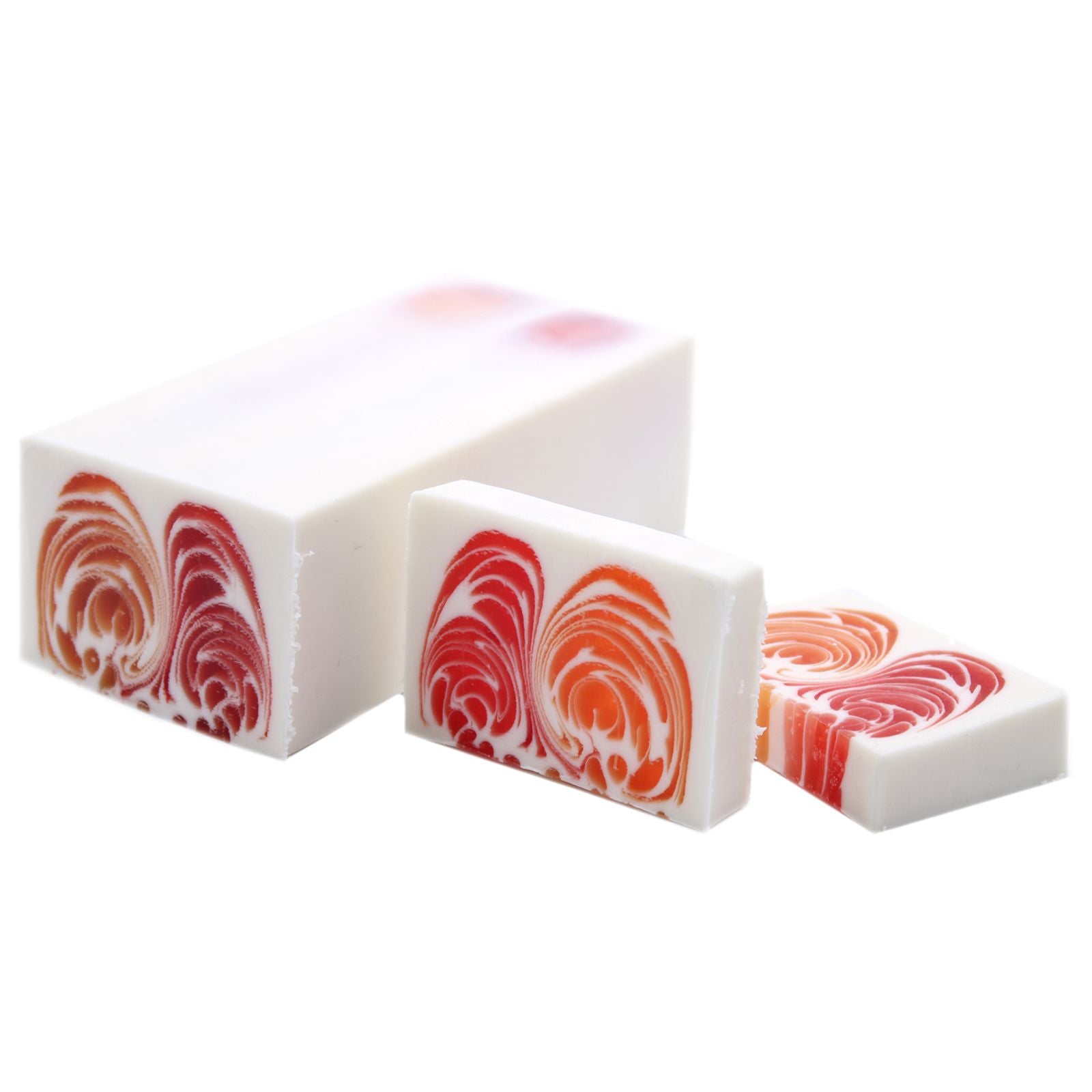 A large, artisanal handcrafted soap loaf with a vibrant grapefruit scent and natural textured finish.