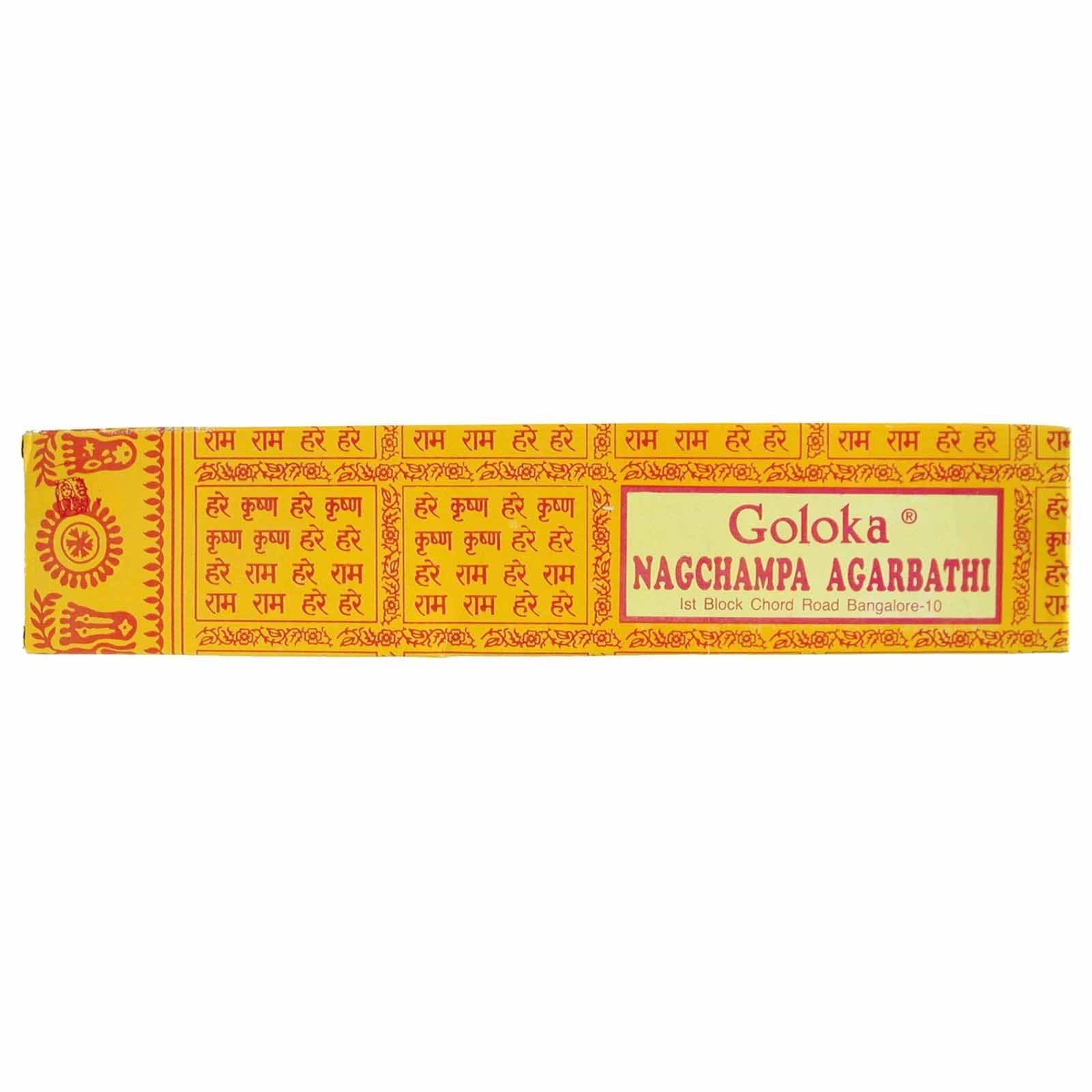 Hand-rolled Nag Champa incense sticks in a classic yellow and blue cardboard box on a neutral background.