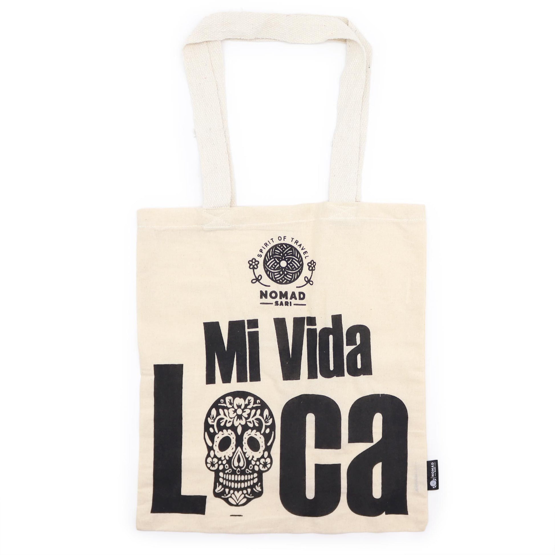 Natural cream-coloured cotton tote bag with a minimalist black typographic design reading Mi Vida Loca.