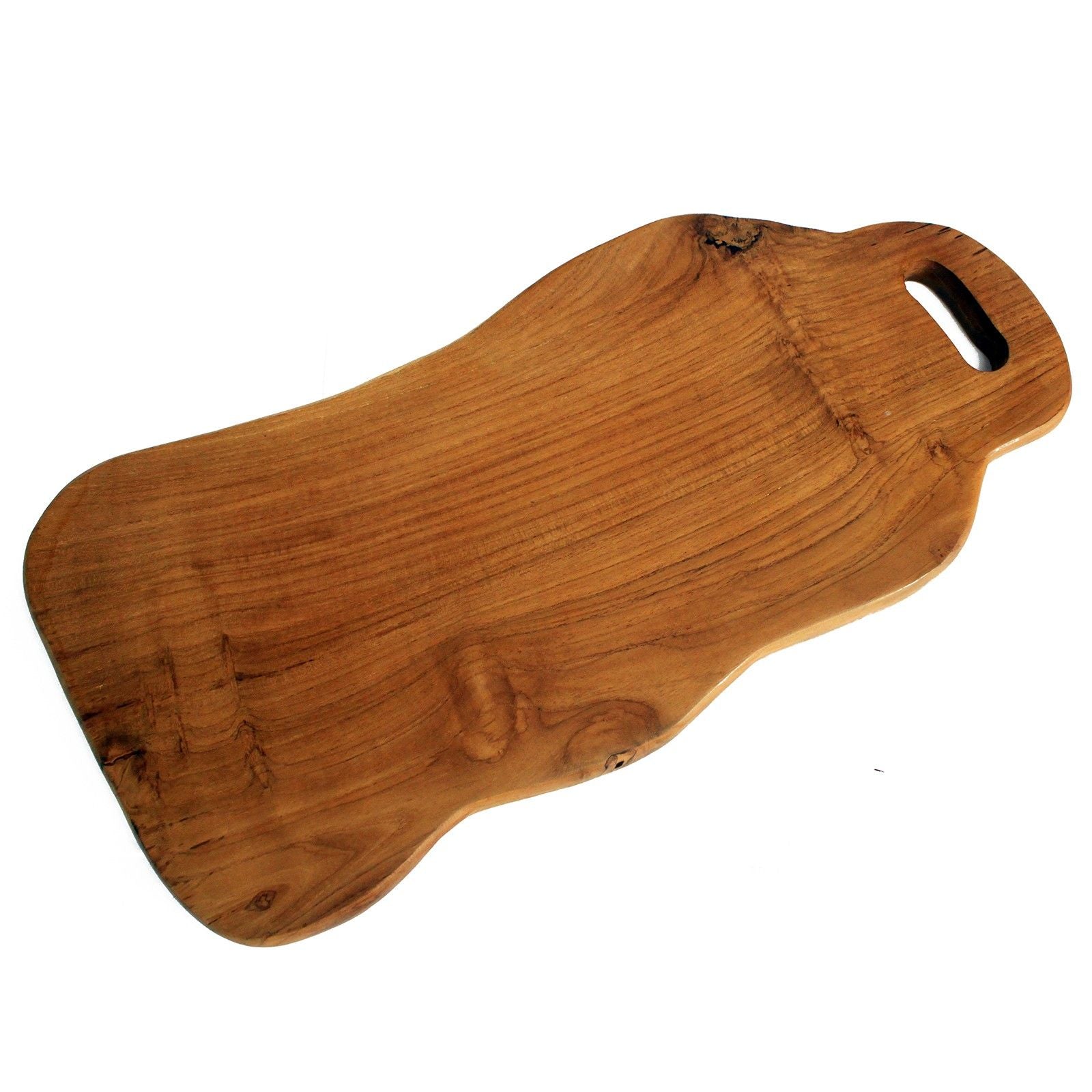 Large hand carved teak wood chopping board with natural grain and rustic finish.