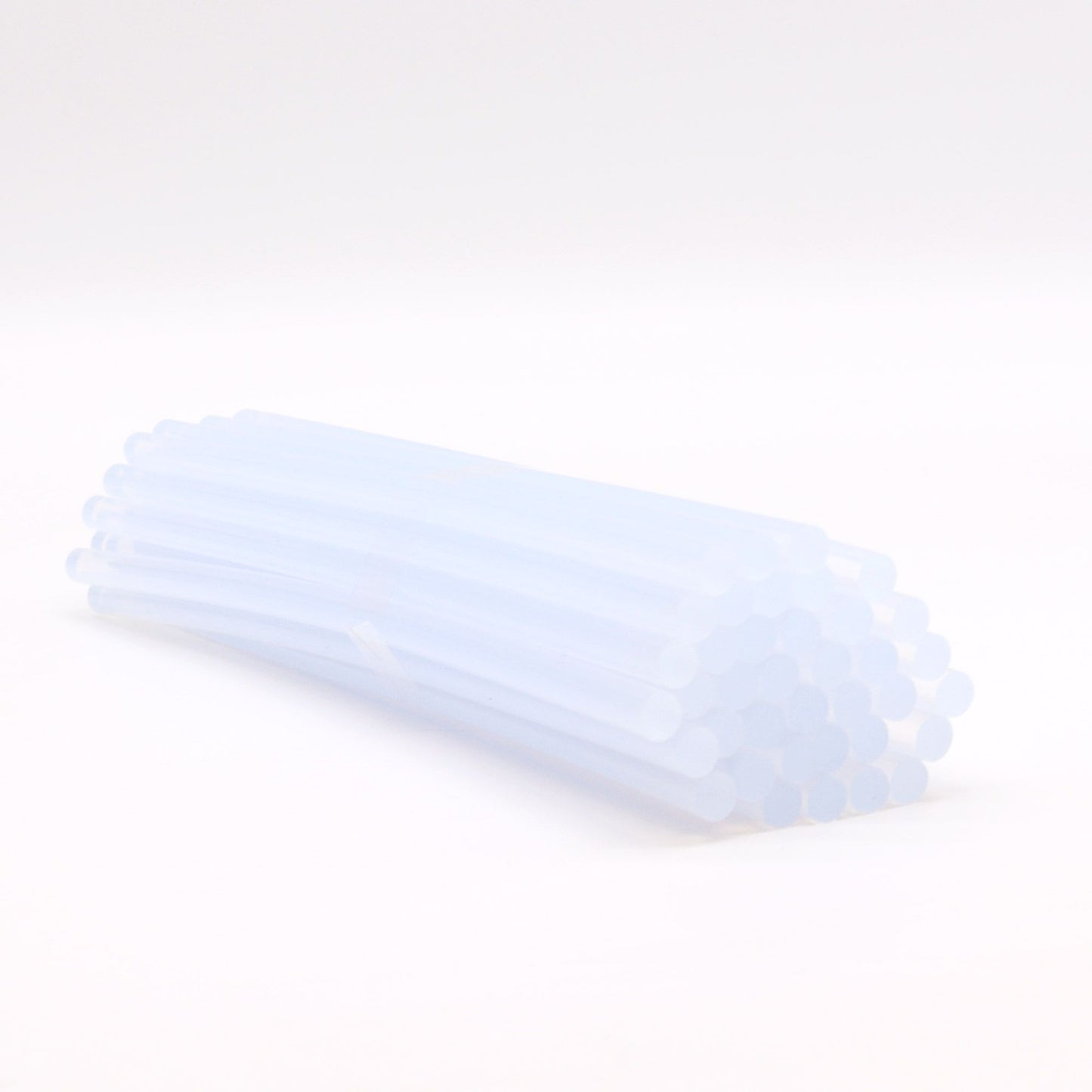 Bundle of clear 11mm diameter hot melt glue sticks for use with standard craft glue guns.