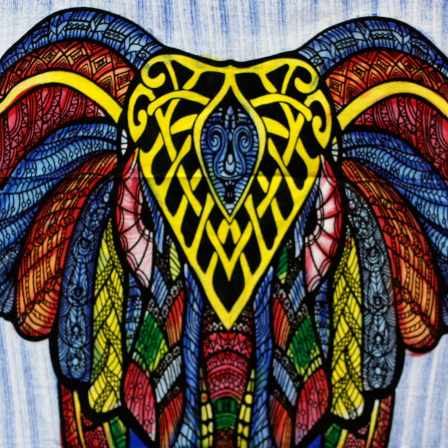 Vibrant handbrushed cotton wall hanging featuring a detailed elephant design with bold colours and artistic patterns.