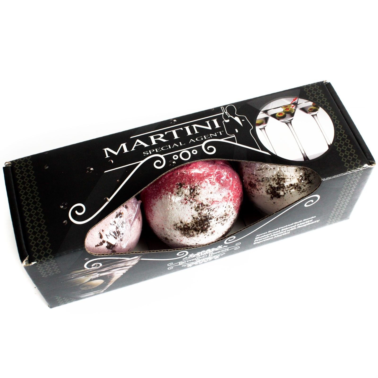 Gift set containing three round, artisanal cocktail-themed bath bombs with colourful textured surfaces.