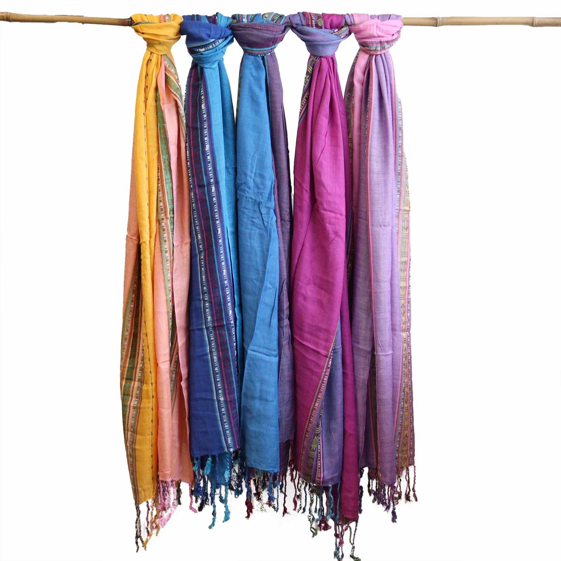 Elegant turquoise blue scarf with intricate patterns inspired by the spiritual city of Varanasi.