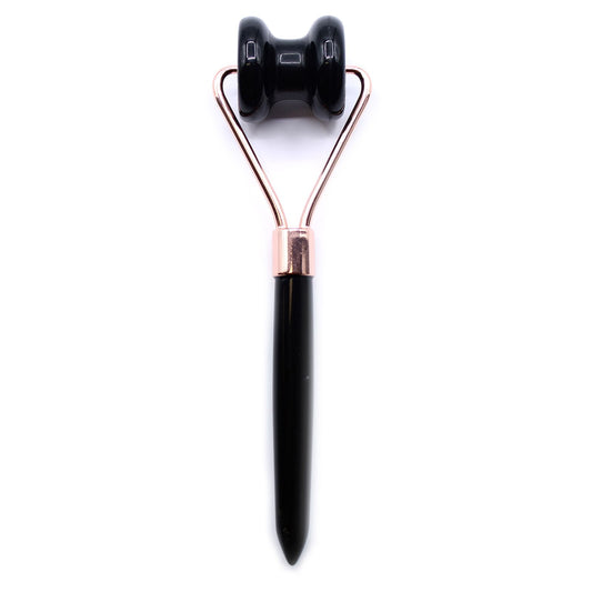 Sleek black obsidian gemstone jawline roller with a smooth finish and sturdy silver-toned metal handle.