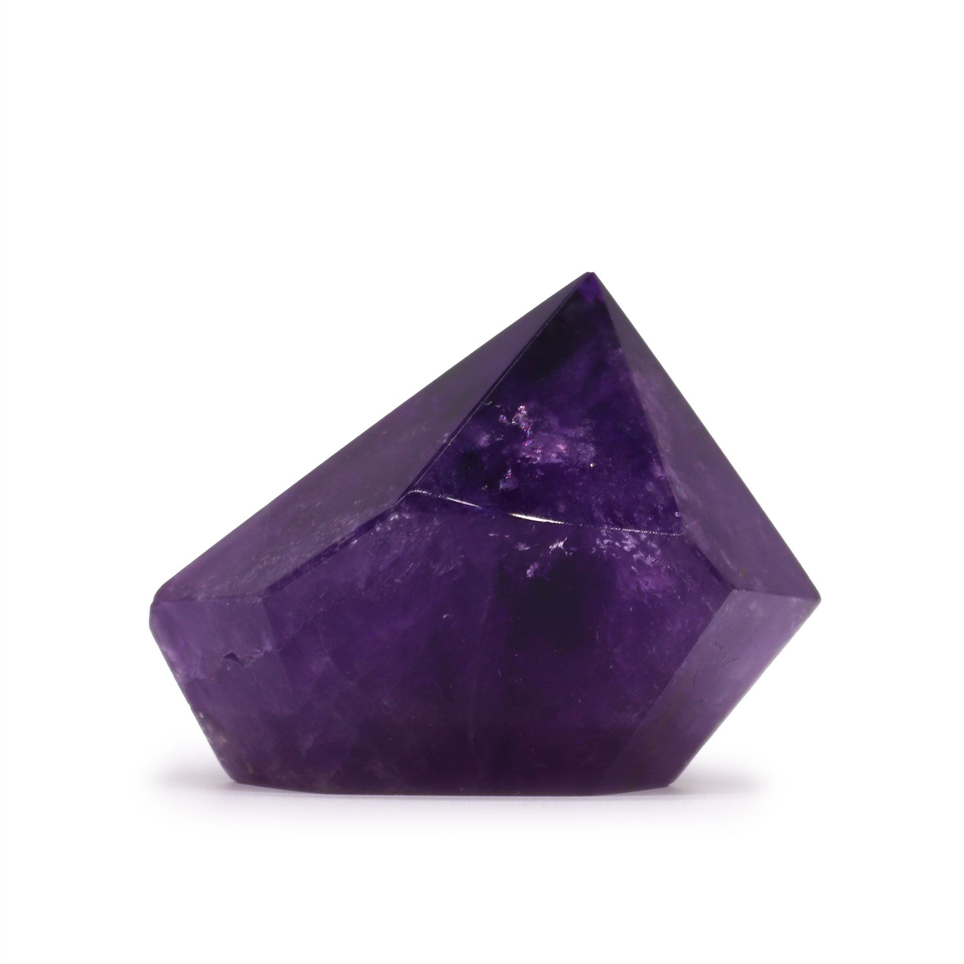 A single polished Amethyst crystal point featuring deep purple hues and natural crystalline inclusions.