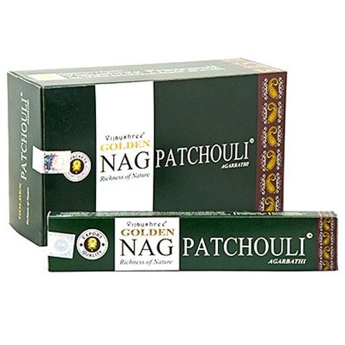 Hand-rolled patchouli incense sticks with an earthy texture, presented in a minimalist setting.