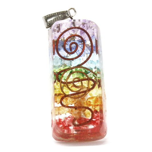 Circular orgonite pendant featuring colourful gemstone chips, copper coils, and metal filings encased in clear resin.