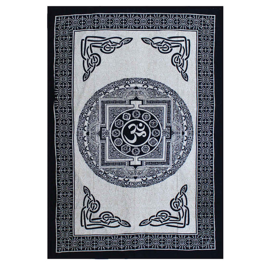 Black and white single cotton bedspread featuring a detailed OM Mandala design used as a decorative wall hanging.