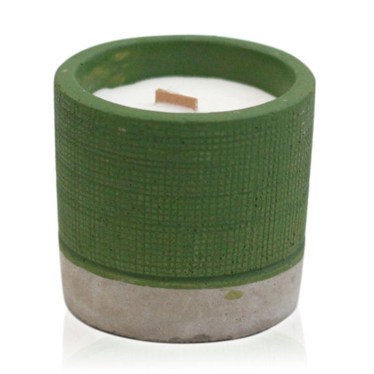 Textured green concrete pot candle featuring a natural wooden wick and minimalist raw aesthetic.