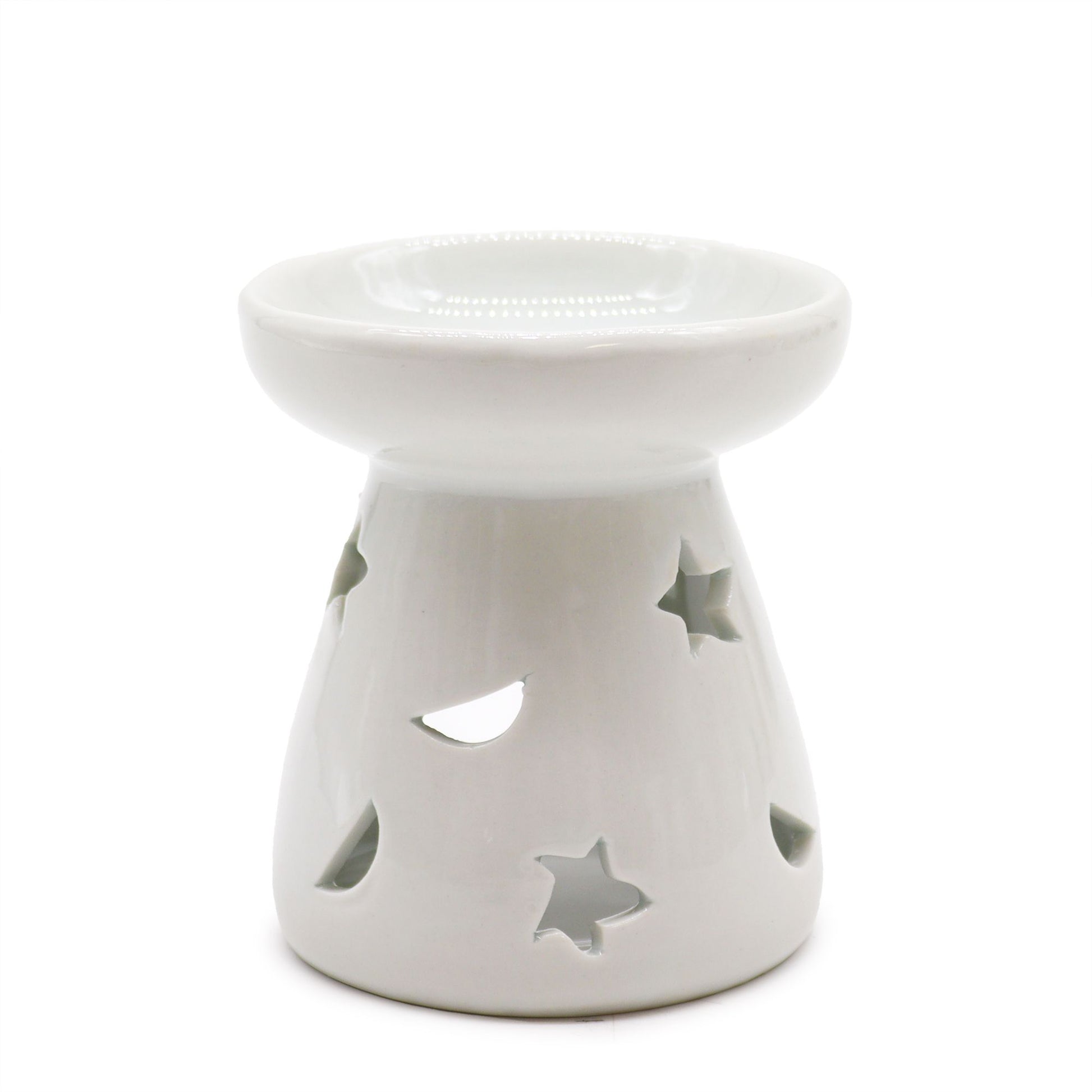 Elegant white ceramic oil burner featuring decorative moon and star cut-outs for a soft glowing light effect.