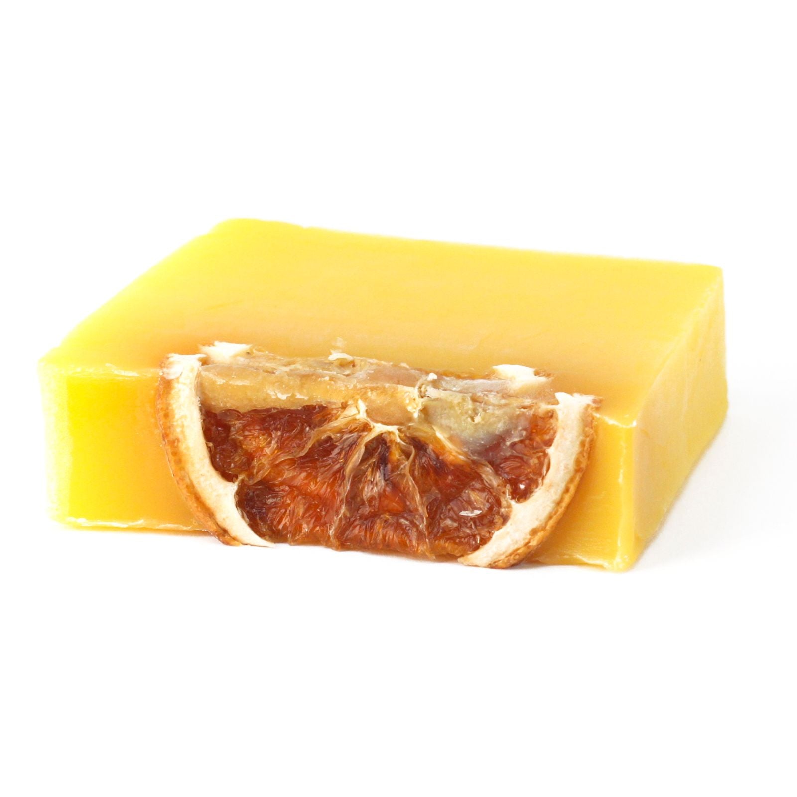 Hand-crafted zesty orange soap slice topped with a dried orange wheel, wrapped in traditional waxed paper.