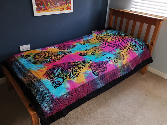 Intricate dreamcatcher design on a single cotton bedspread, suitable for use as a bohemian wall hanging or bed throw.