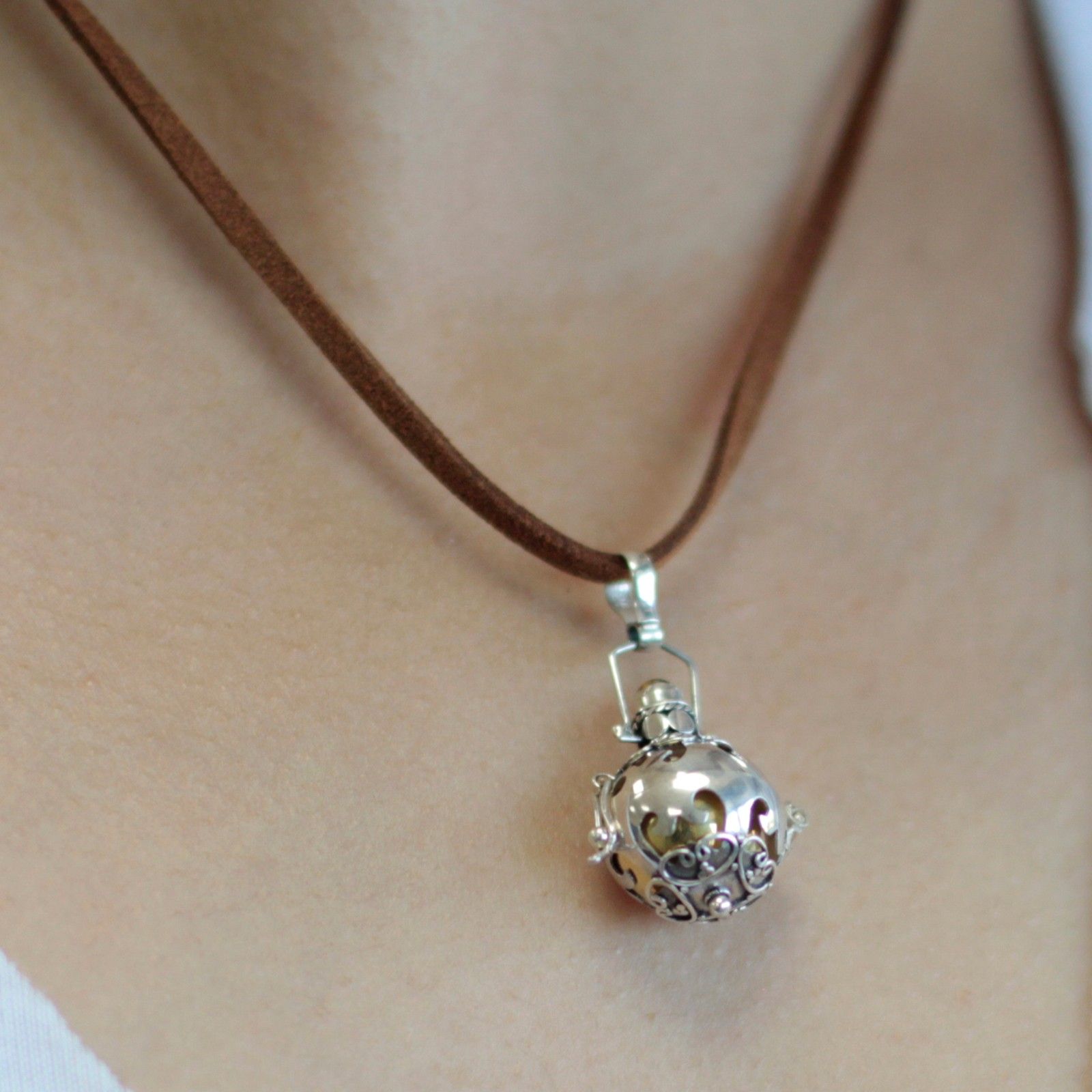 Intricate 16mm 925 sterling silver angel bell pendant with detailed ornate patterns and a small ringing clapper.