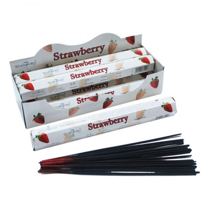 Hexagonal box of strawberry scented incense sticks with a vibrant red strawberry illustration on a white background.