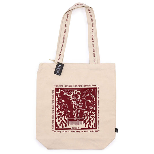 Black cotton tote bag featuring a white tarot card design of The Devil with the empowering text I Am Rare.