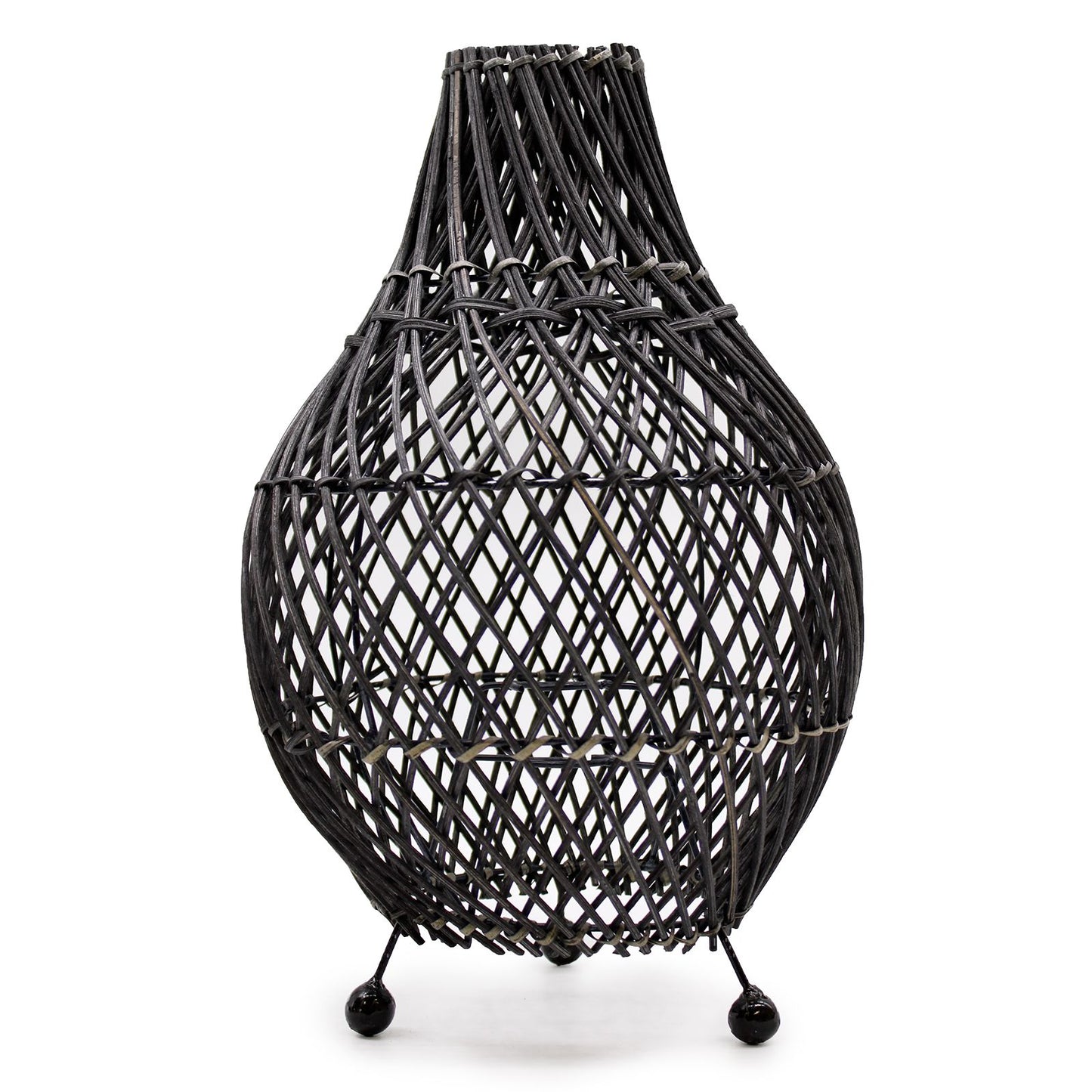 Handcrafted black natural rattan table lamp with intricate woven patterns and a minimalist cylindrical design.