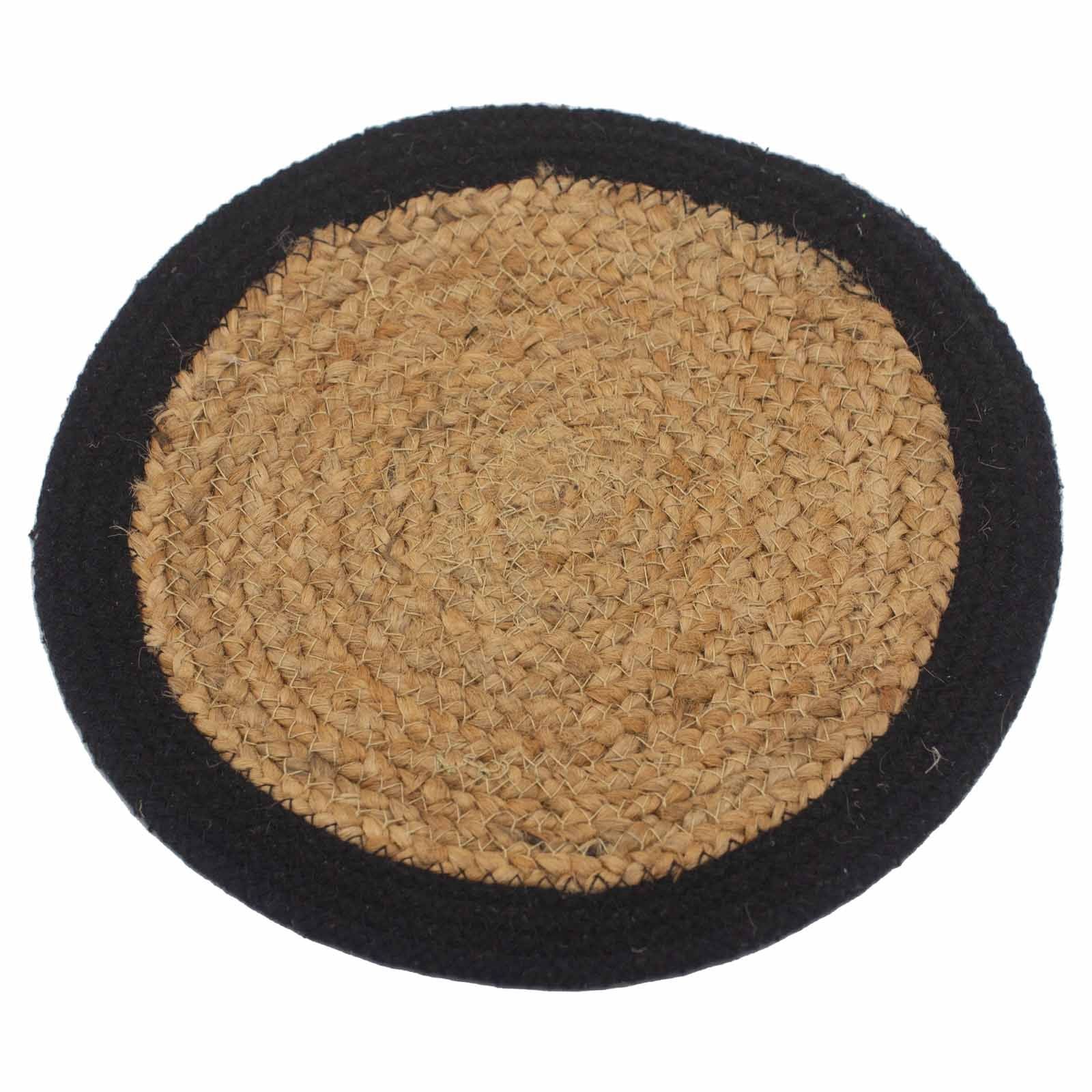 Round natural jute and cotton woven placemat with a decorative black stitched border on a neutral background.