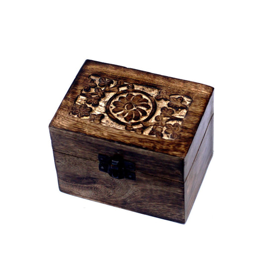 Hand-carved mango wood storage box with a delicate floral design, featuring six internal compartments for oil bottles.