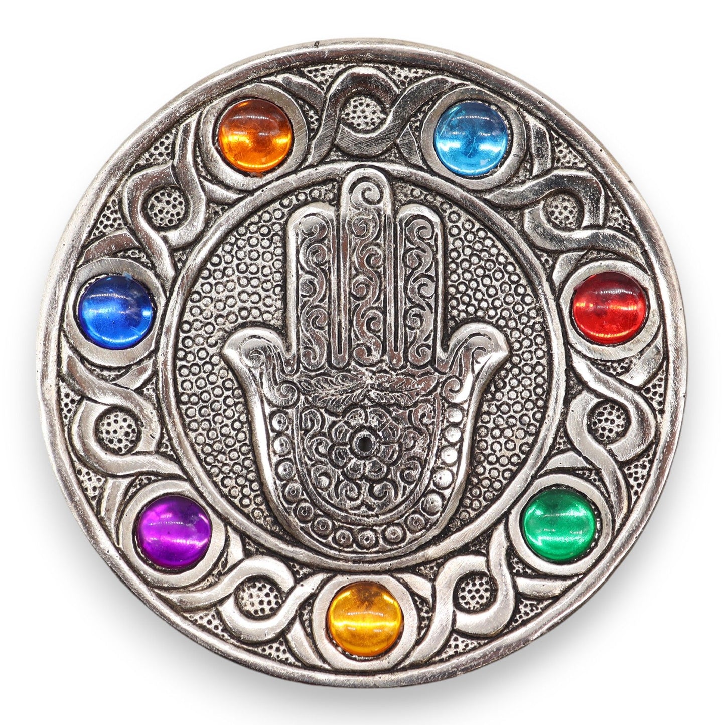 Handcrafted silver-coloured aluminium Hamsa hand incense holder decorated with seven colourful chakra stones.