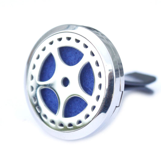 Silver 30mm locket car diffuser with a decorative auto wheel design and a clip for vehicle air vents.