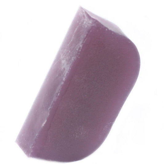 Handcrafted purple and green marbled solid shampoo bar slice with lavender and rosemary botanicals.