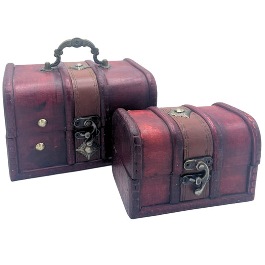 Two rustic natural wood treasure chests in varying sizes with metal latches and a vintage finish.