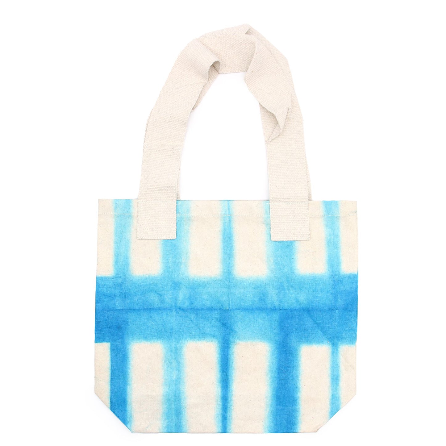 Handmade 100% natural cotton tote bag featuring a unique sky blue block tie-dye design and natural fabric handles.
