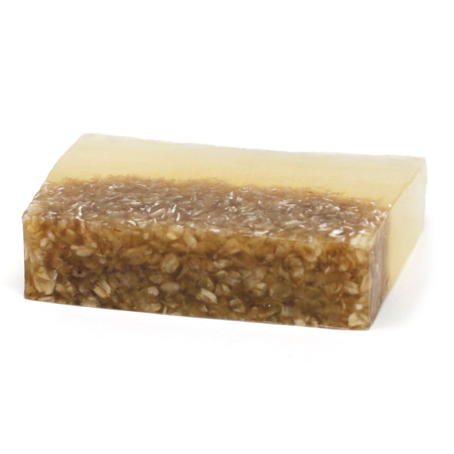Handcrafted rectangular soap bar with visible textured oatmeal grains and a rich golden honey hue.