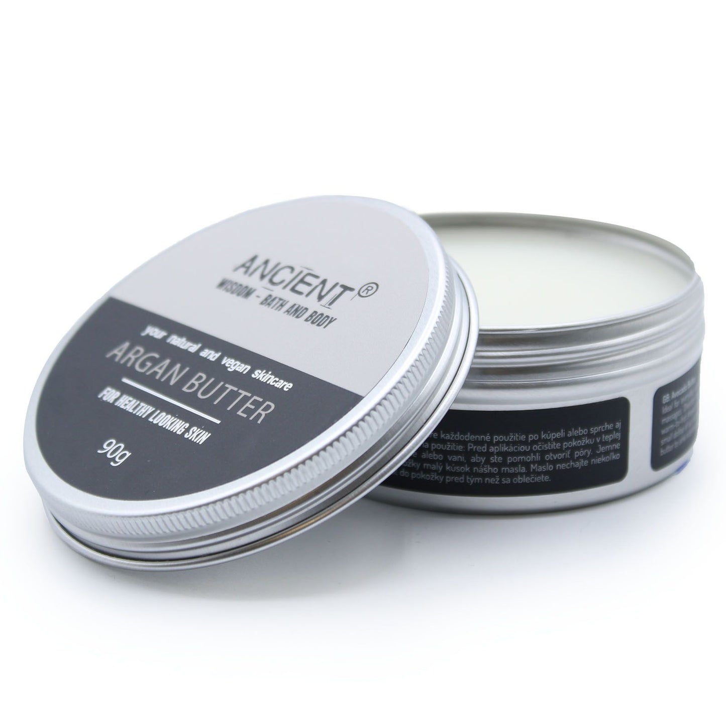 Circular metal tin containing smooth cream-coloured argan body butter for intensive skin hydration.