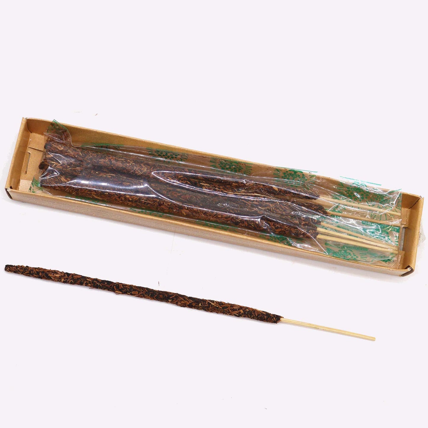 Handcrafted Palo Santo masala incense sticks showing a natural botanical texture and earthy wood tones.