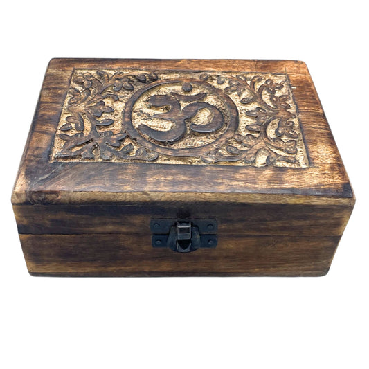Hand-carved medium wooden keepsake box featuring a detailed Om symbol on the lid with a natural wood finish.