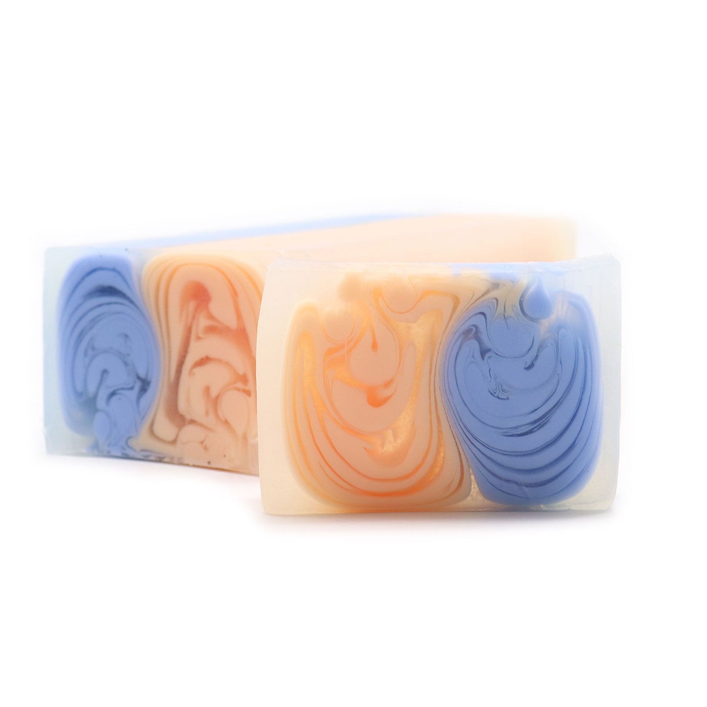 Artisanal handcrafted soap loaf with a rich textured design and evocative earth tones.