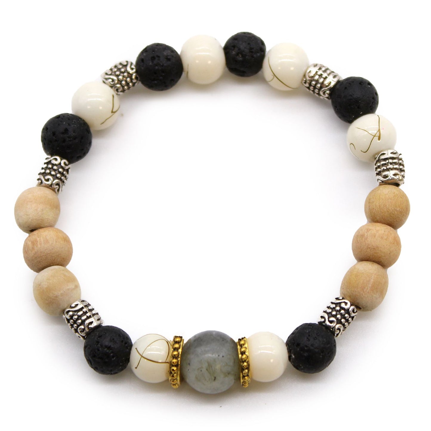 Handcrafted cord bangle featuring white, black, and grey threads woven together in a traditional Balinese style.
