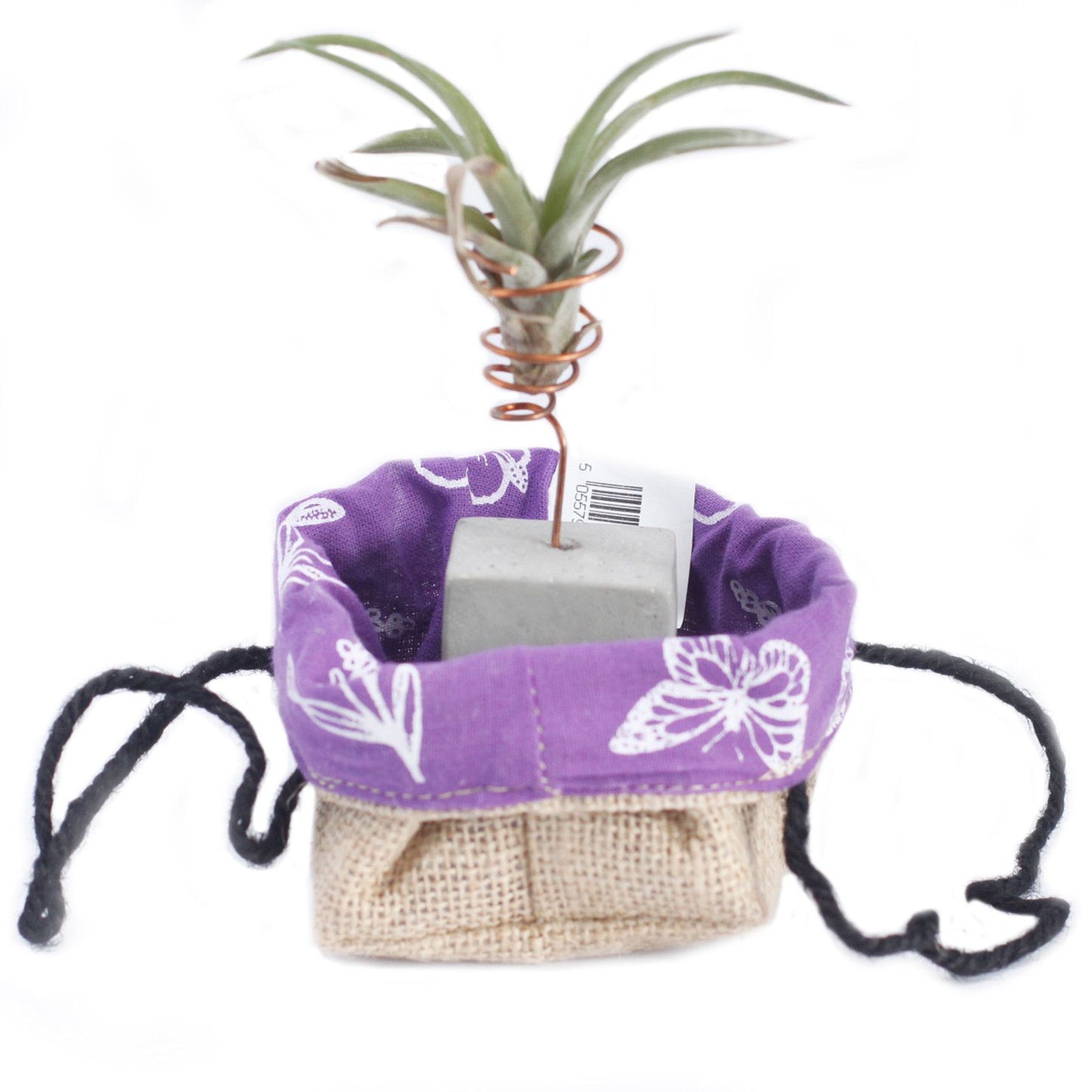 Small natural jute gift bag with a visible lavender purple cotton lining and sturdy woven handles.