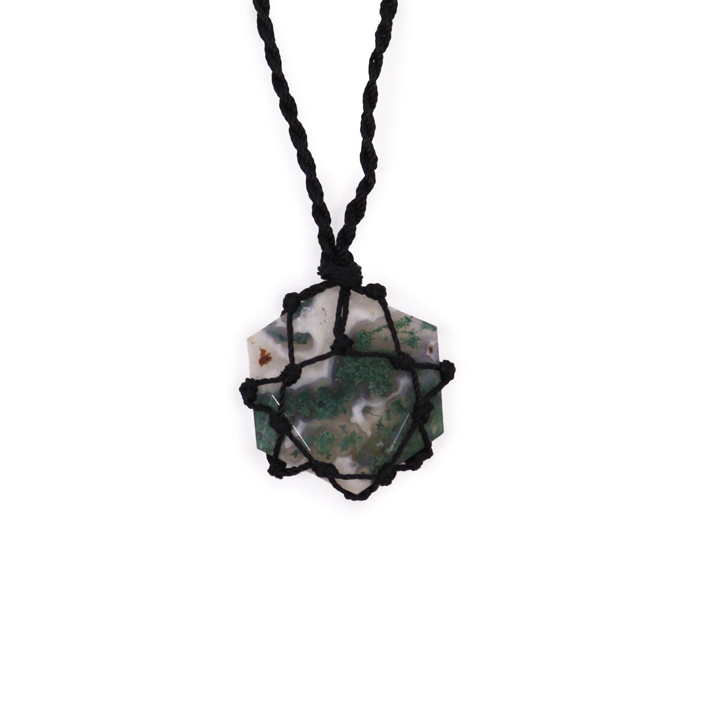 Hexagonal moss agate gemstone pendant featuring natural green patterns and decorative silver-tone metal lacing.