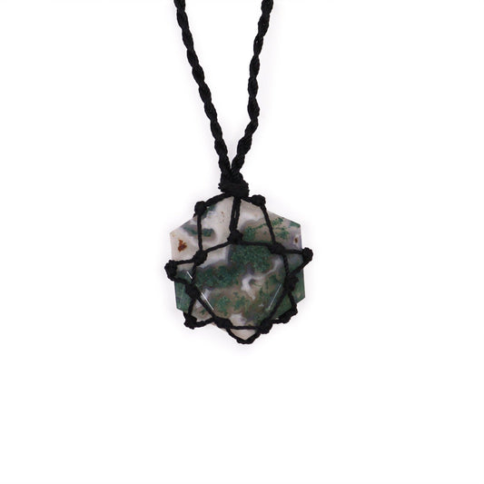 Hexagonal moss agate gemstone pendant featuring natural green patterns and decorative silver-tone metal lacing.