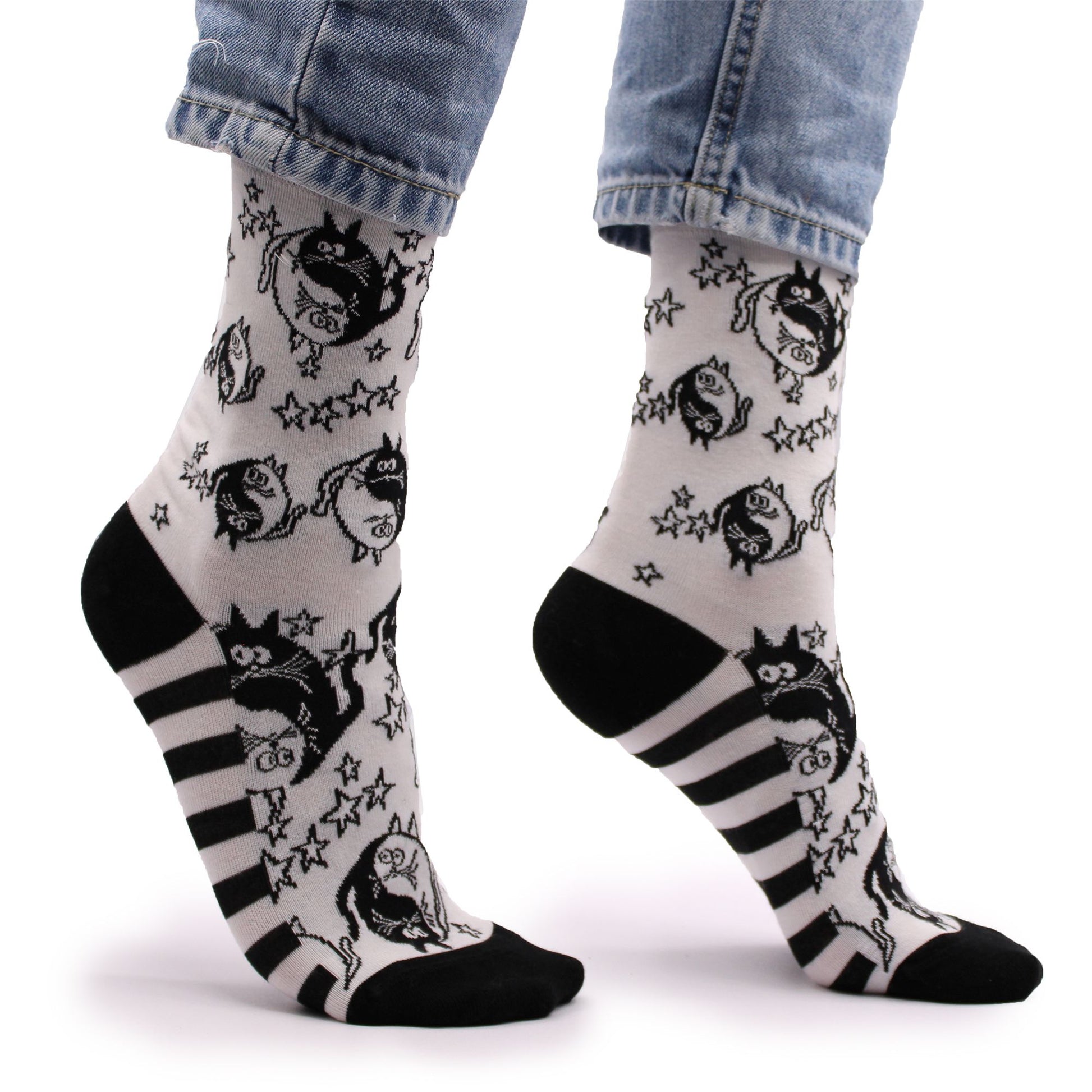 Soft bamboo socks featuring a black and white Yin Yang symbol pattern with a smooth toe seam.