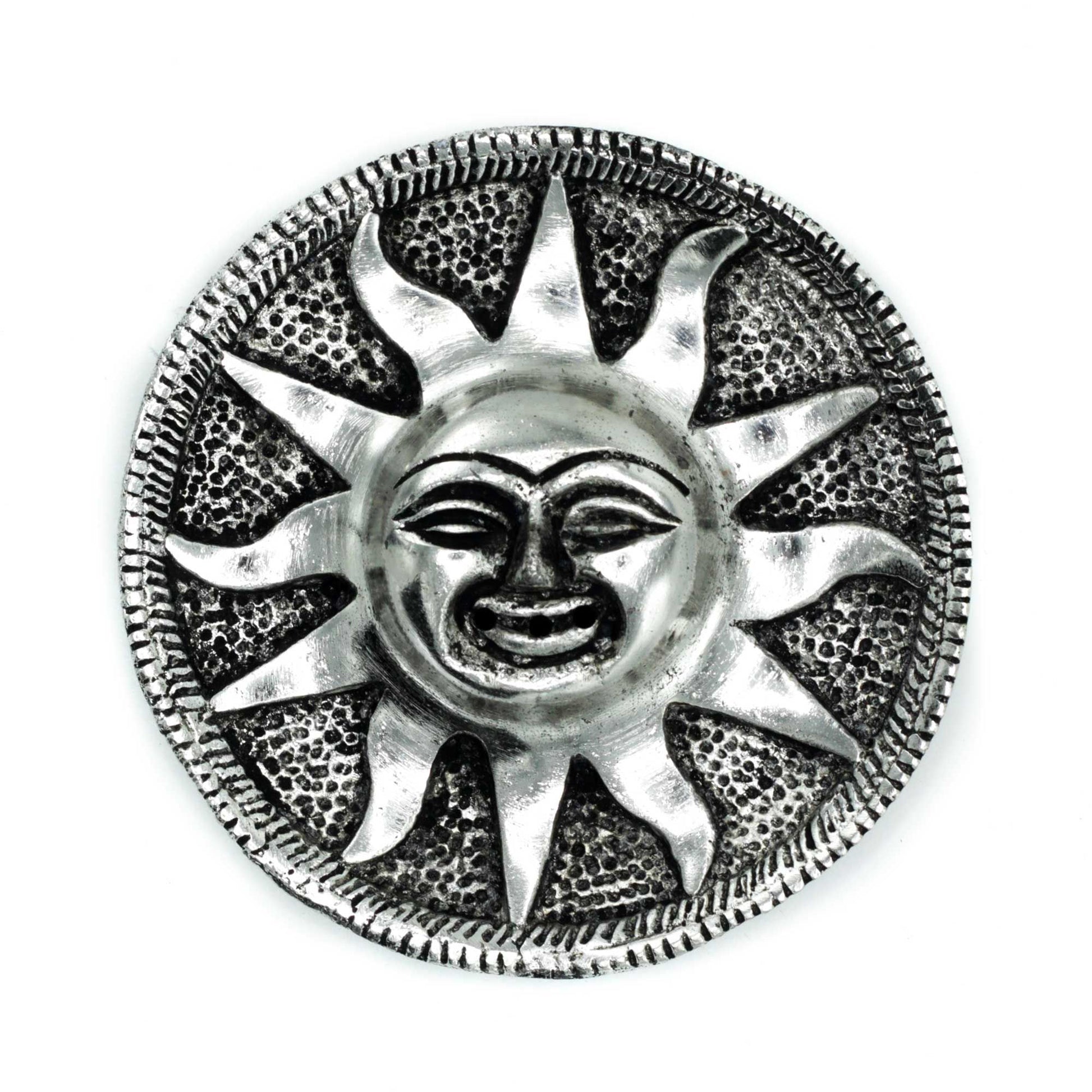 Round polished aluminium incense holder featuring an intricate sun design with a reflective metallic finish.