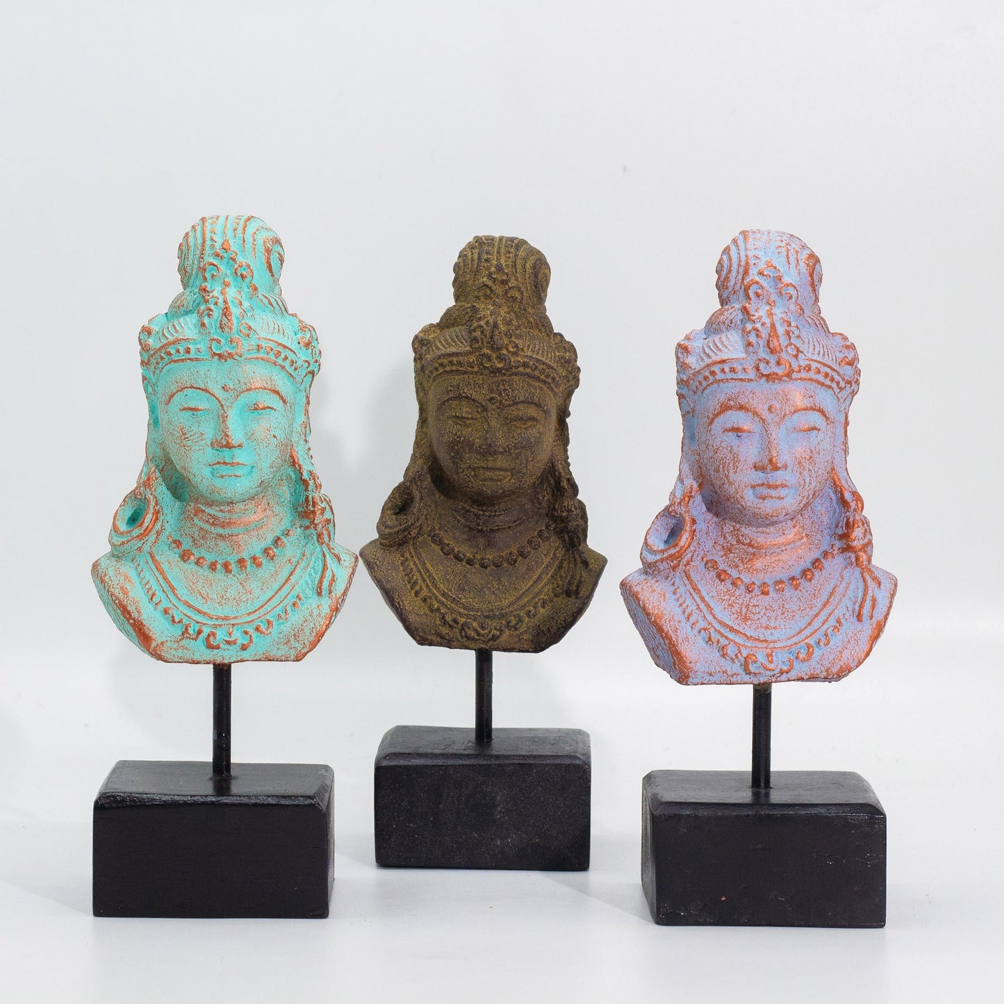 Elegant green copper Javanese princess statue on a dark decorative stand featuring intricate traditional detailing.