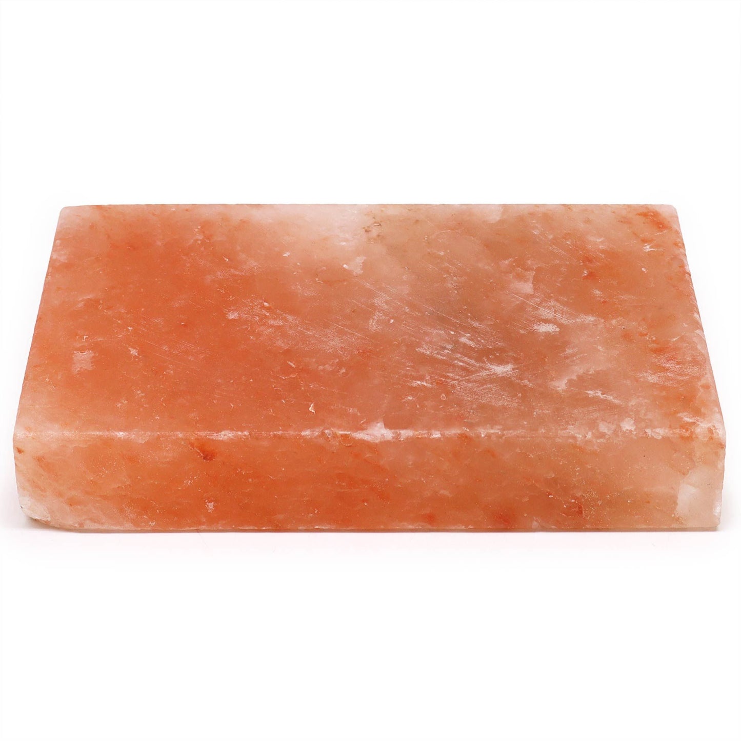 Large rectangular pink Himalayan salt block for cooking and serving on a neutral background.