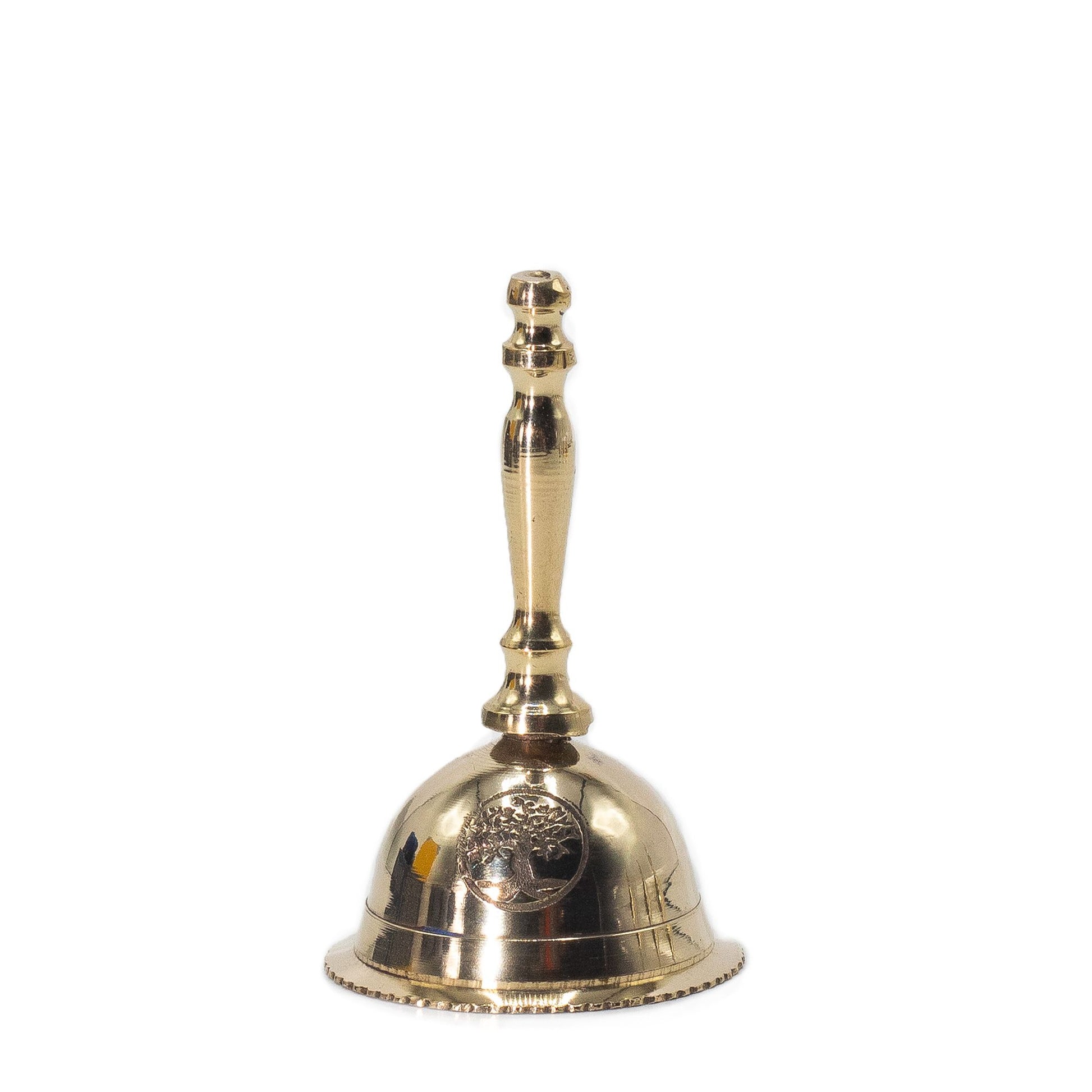Handcrafted small solid brass altar bell featuring an engraved Tree of Life design with a polished finish.
