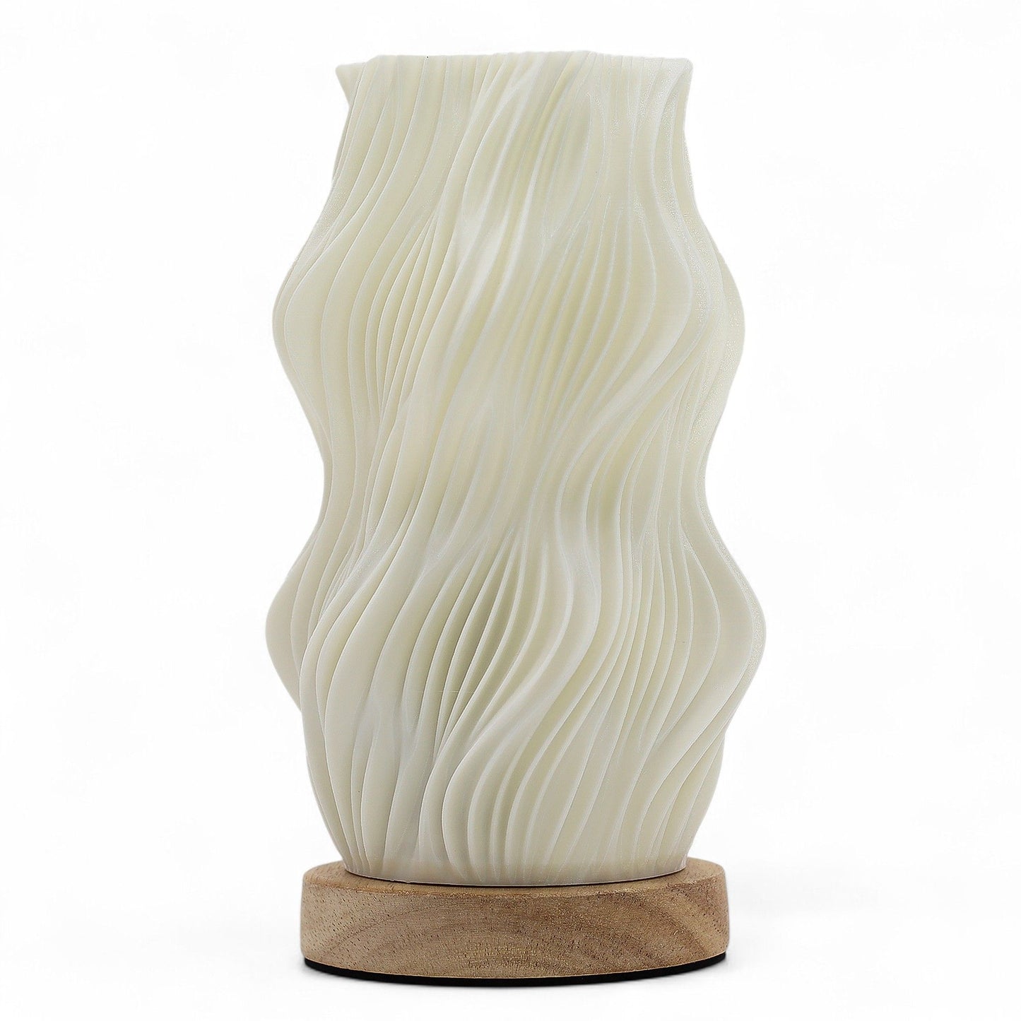 Modern twisted sculptural lamp with a star-inspired silhouette and warm ambient lighting.