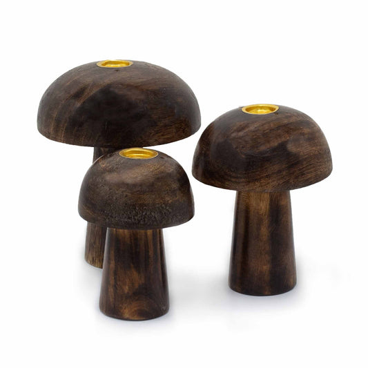 Three decorative ceramic mushroom-shaped incense cone holders in varying sizes on a plain background.