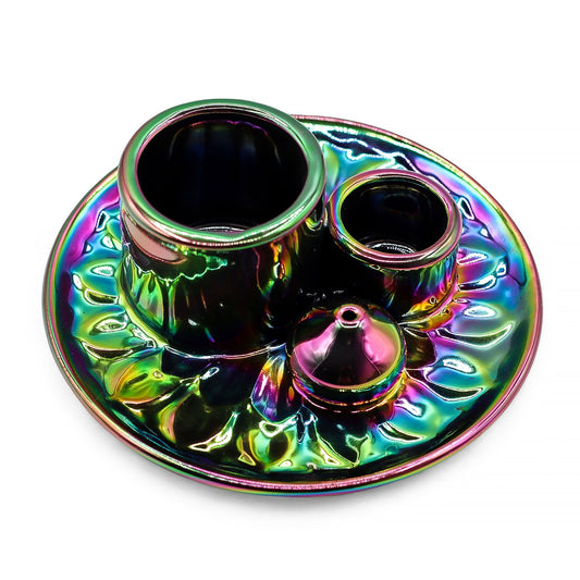 Metallic rainbow ceramic smudge holder featuring a detailed mandala design and a central hole for Palo Santo sticks.