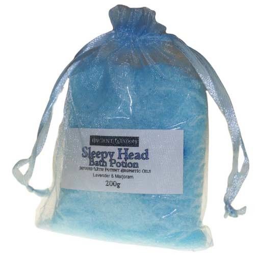 A small bag of blue-tinted aromatherapy bath salts infused with lavender and marjoram essential oils.