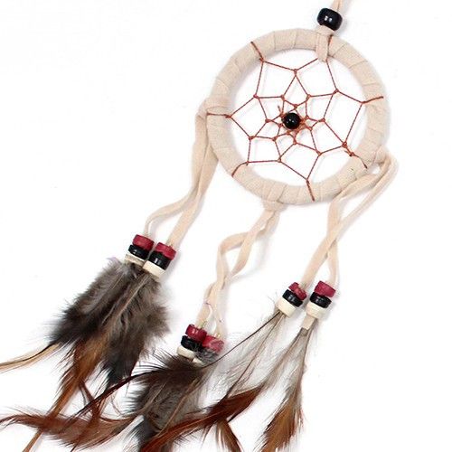 Small round dreamcatcher with cream, coffee, and chocolate brown webbing and feathers.