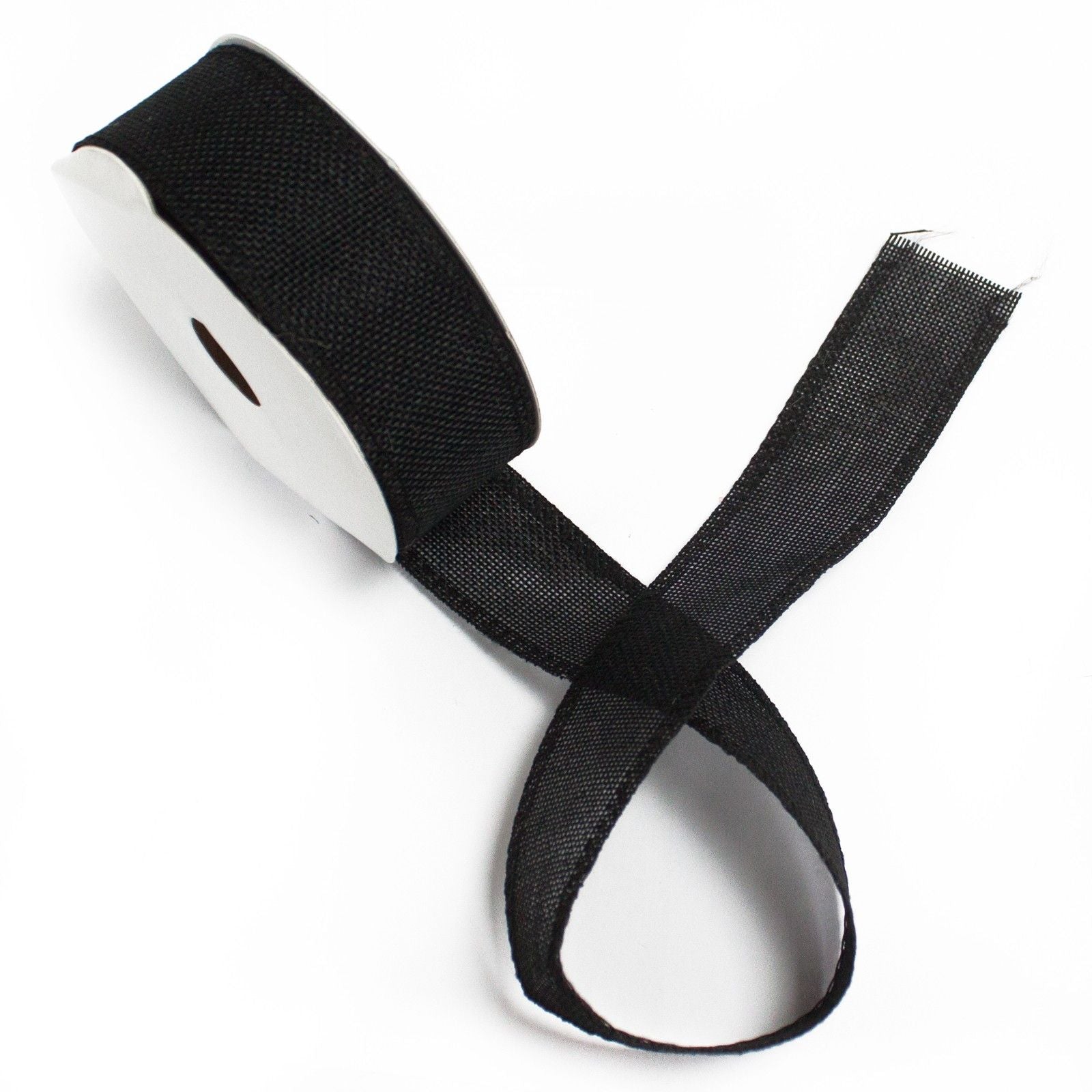 Roll of wide black natural texture ribbon with a unique non-woven fabric finish for gift wrapping and crafts.