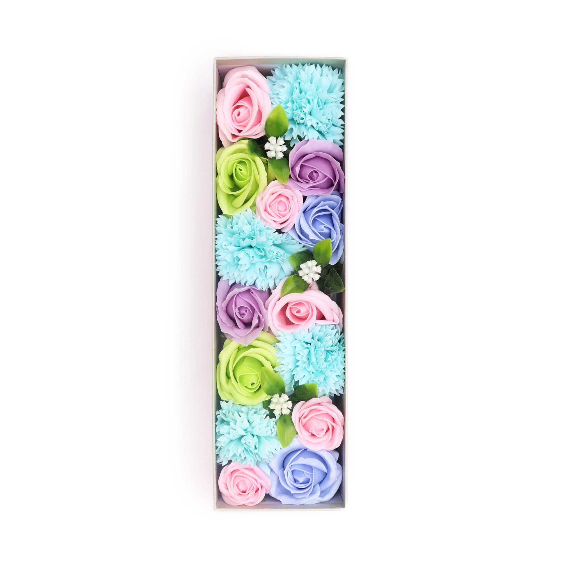 Long gift box filled with handcrafted soap flowers in various shades of blue and white petals.